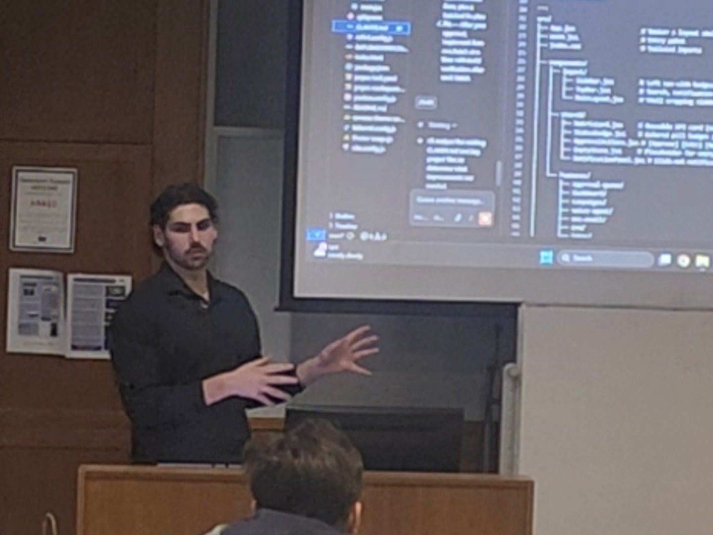 Zackary Hanna speaking at an HWS AI Club session